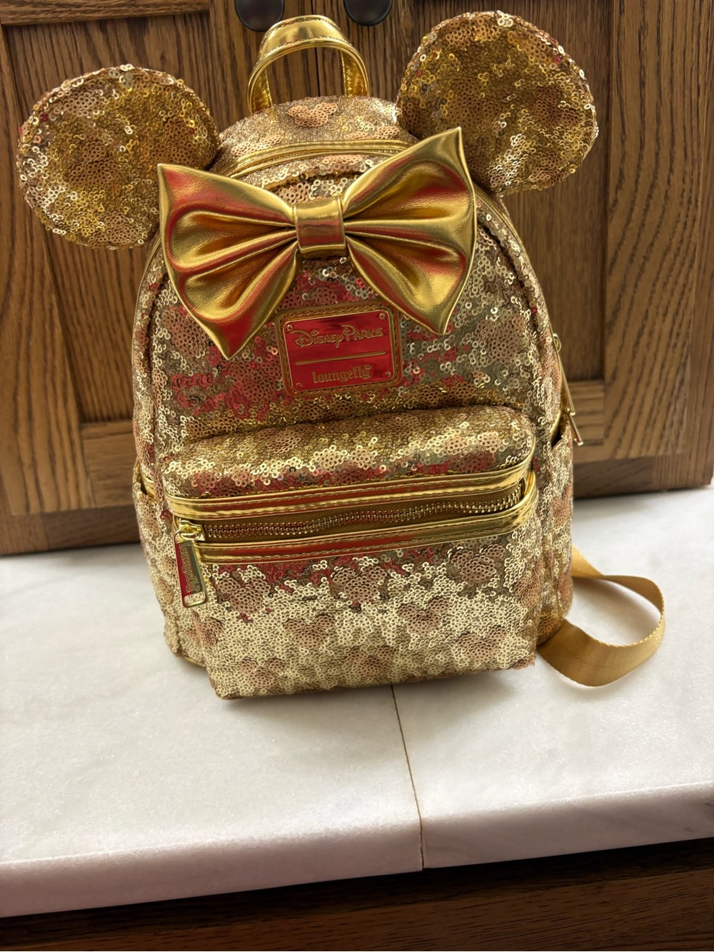 Loungefly Gold Sequin Minnie Ear Mini Backpack with Metallic Bow